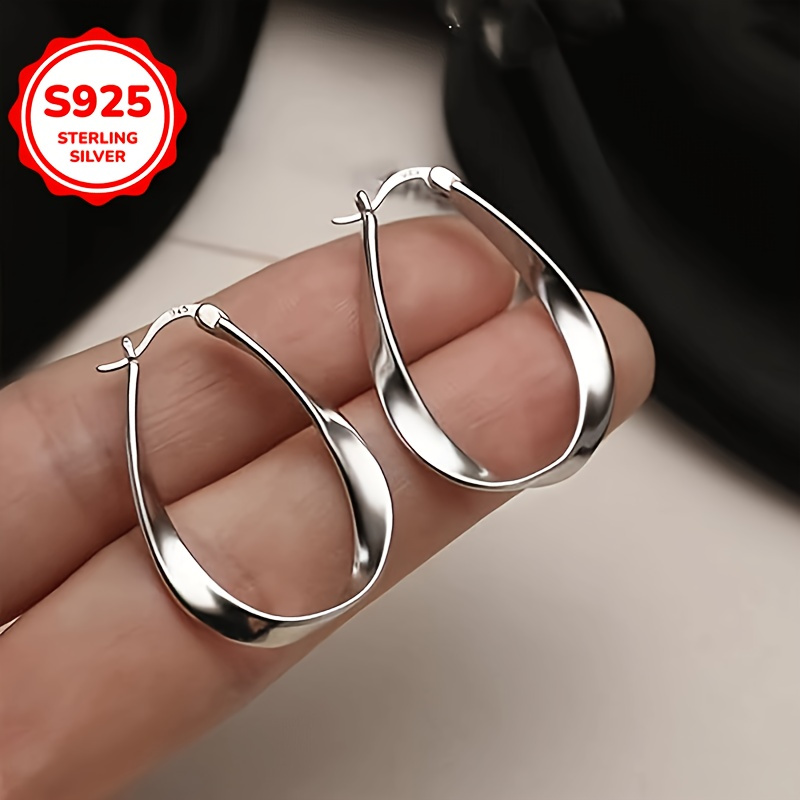 Image of Ladies' S925 Silver Möbius Twist Earrings – Elegant, Hypoallergenic, Perfect As A Gift For Your Girlfriend Or For Everyday Wear