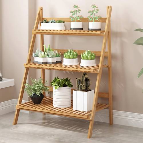 a 1 piece wooden brown and white natural bamboo plant stand 3 tier foldable flower rack with removable storage shelves suitable for indoor plant decoration on and living rooms featuring aesthetic design dimensions 70x40x96 cm