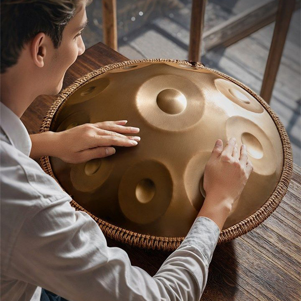   d   stainless steel handpan drum or sound healing and meditation 9 tone deep golden with carry bag stand 2 hand   music note stickers wiping cloth