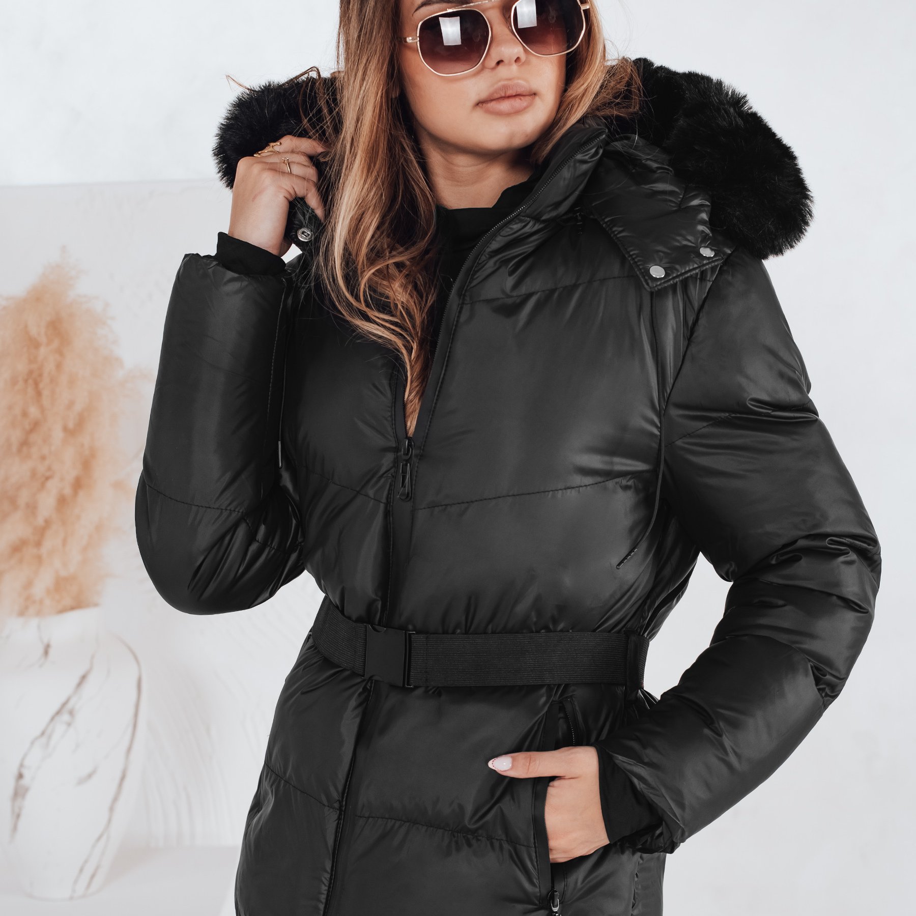 Image of Women's Quilted Winter Jacket With Waist Belt And Detachable Fur Hood, Stylish And Warm Outerwear For Winter, Padded Women's Jacket With Pockets And Drawstrings, Elegant Coat