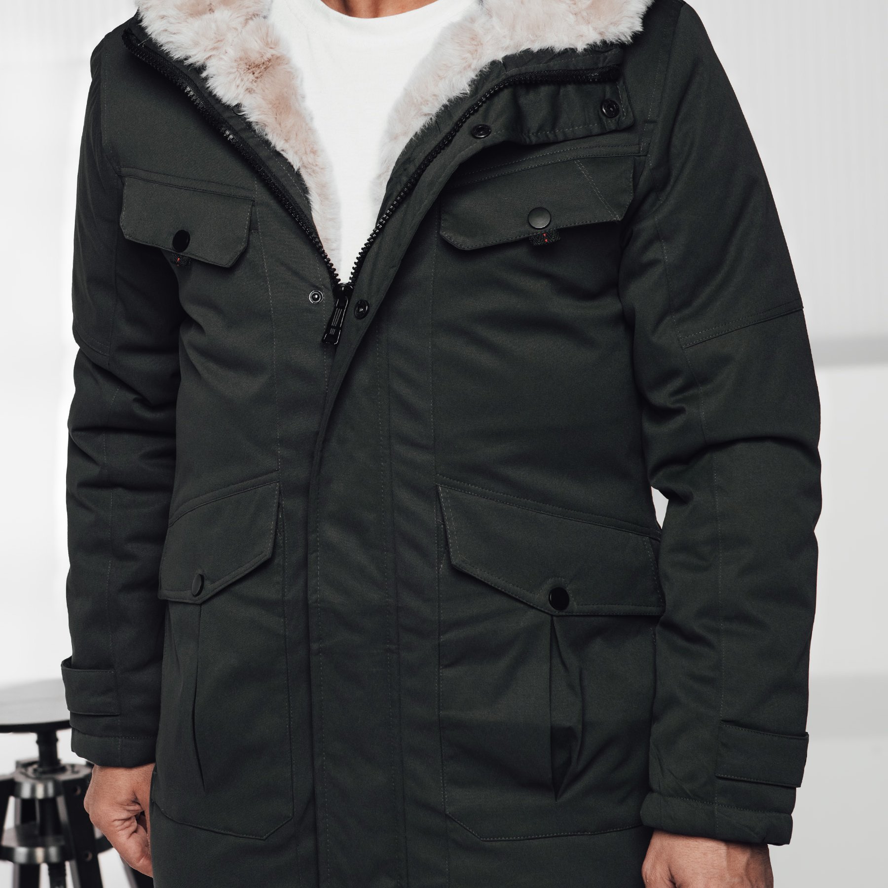 Image of Men's Winter Parka With A Hood And Artificial Fur Collar, Warm Outerwear With A Quilted Lining, Practical Everyday Jacket With Many Pockets, Elegant And Functional Parka For Winter For Men.
